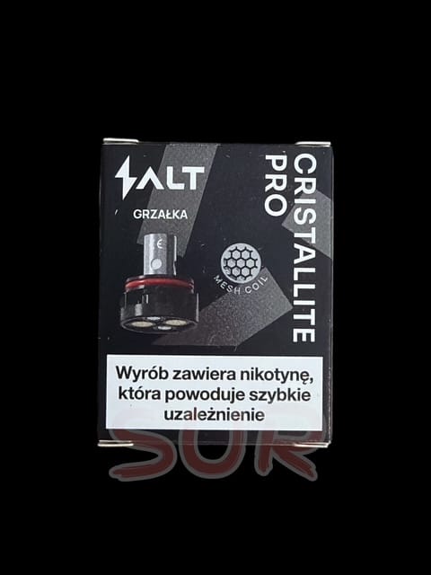 Makro zdjęcie grzałki typu mesh z widocznymi osadami lub krystalizacją substancji słodzących.